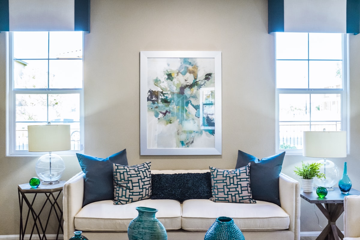 Close up of dried beige pampas grass in a sharp textured brown clay pot, stark contrast, minimal lifestyle photography, warm tones, no human